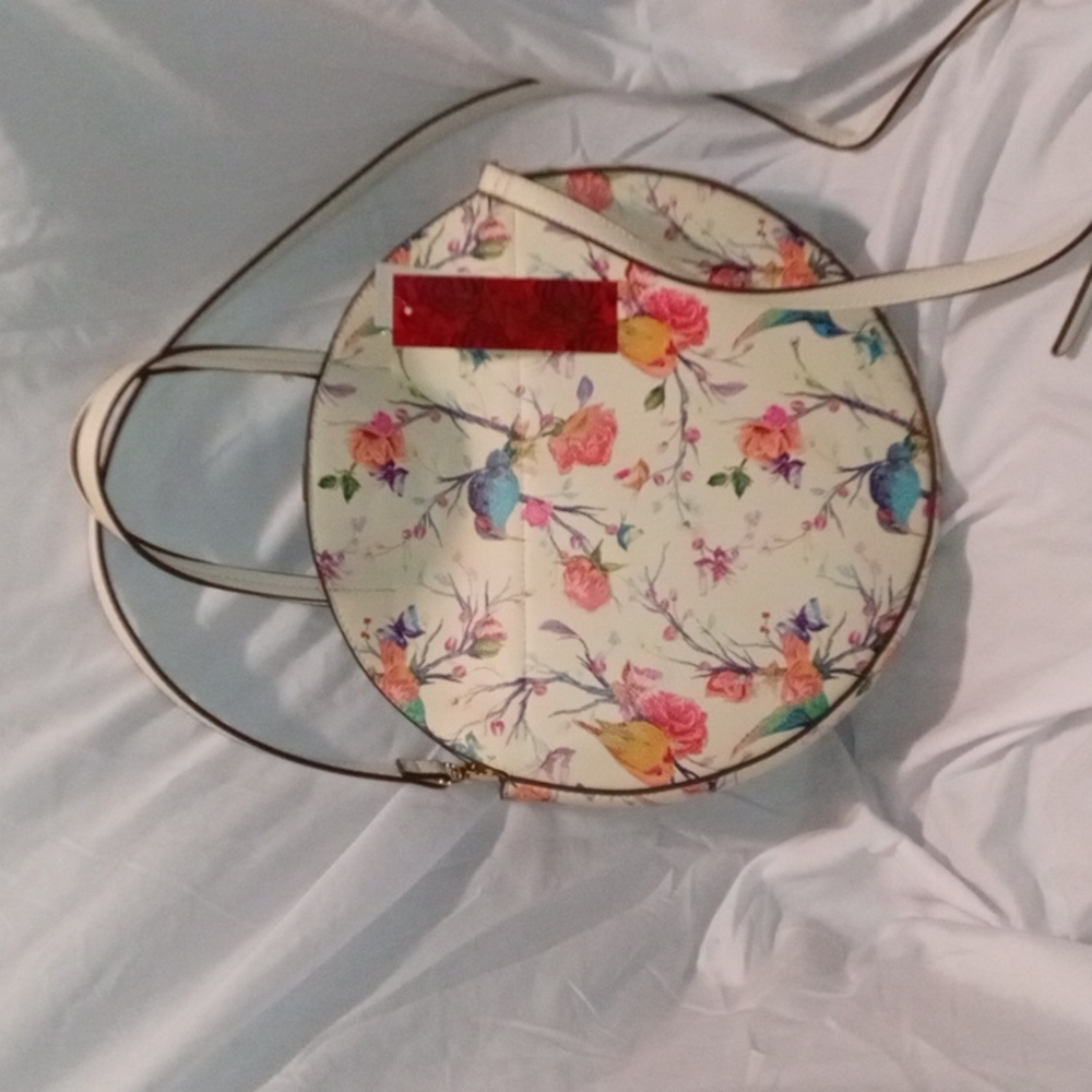 Carlos Santana purse